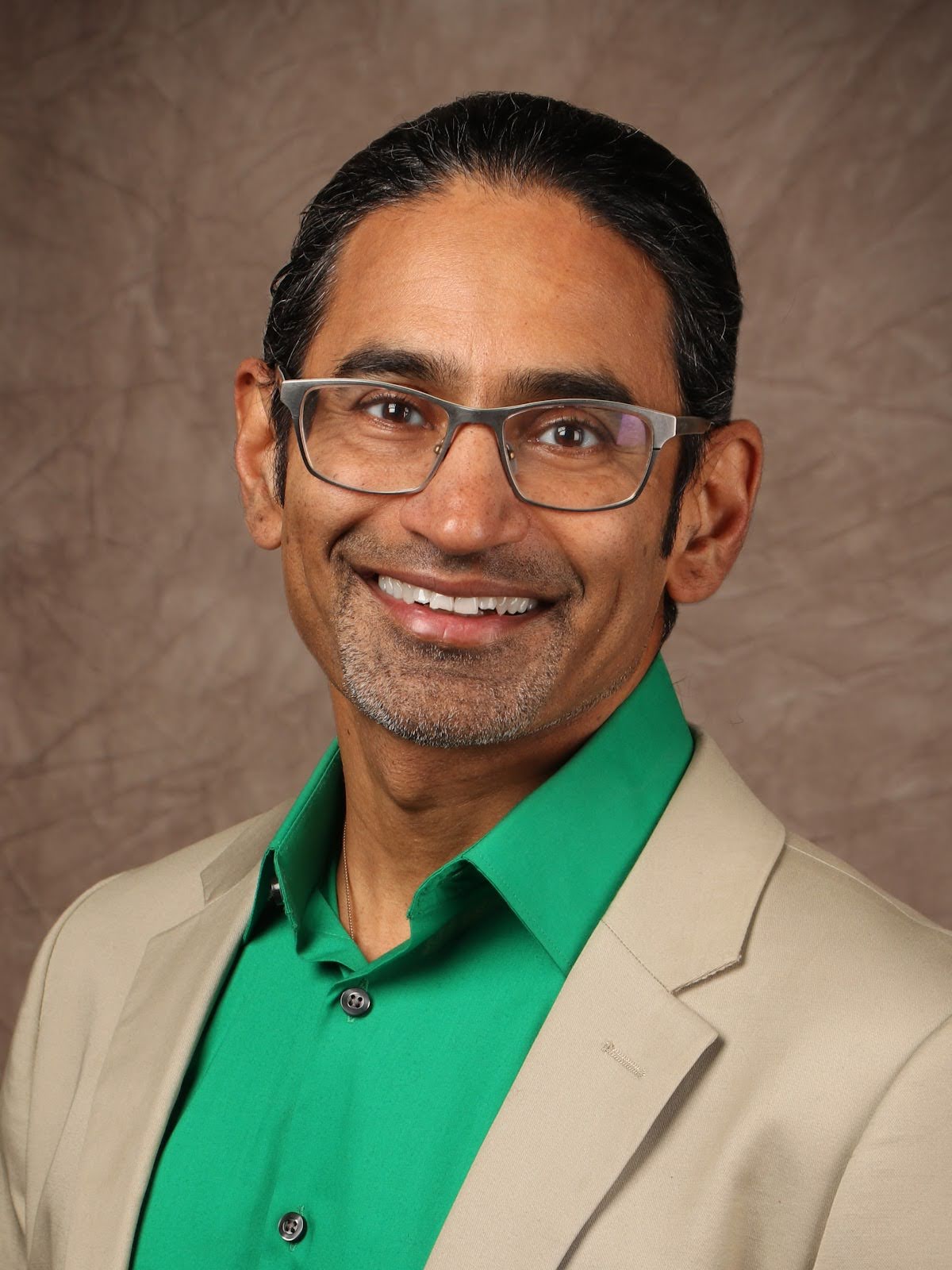 A portrait photo of Atul Deshmane